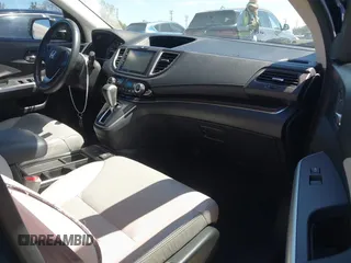 2015 Honda CR-V EX-L with VIN 2HKRM3H71FH549832, listed as a IAAI auction lot 42024750 with 125,734 mi miles. Bid and sale history available at carsss.com. Image 5.
