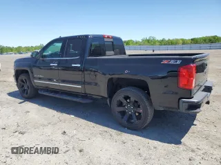 2017 Chevrolet Silverado 1500 LTZ with VIN 1GCVKSEC5HZ149848, listed as a Copart auction lot 54541825 with 104,291 mi miles and Salvage Title. Bid and sale history available at DreamBid. Image 2.