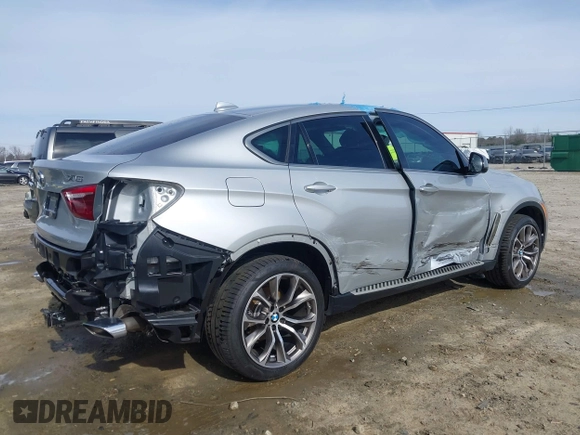 2019 BMW X6 xDrive35i z VIN 5UXKU2C52K0Z63984, wystawiony jako IAAI lot #41612265 z przebiegiem 65 634 mil mil oraz . Historia ofert i sprzedaży dostępna na DreamBid. Obrazek 6.