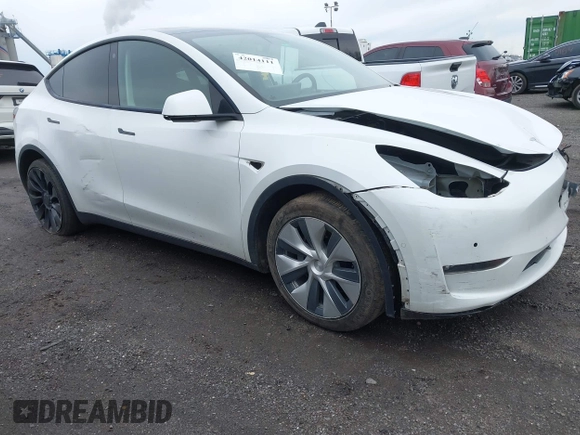 2022 Tesla Model Y Long Range z VIN 7SAYGDEE7NF389788, wystawiony jako IAAI lot #42014111 z przebiegiem 37 606 mil mil oraz . Historia ofert i sprzedaży dostępna na DreamBid. Obrazek 18.