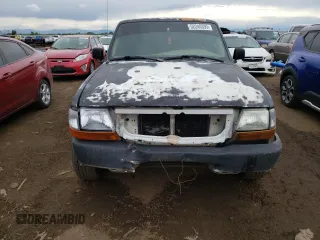 1999 Ford Ranger XL z VIN 1FTYR14C9XPA30991, wystawiony jako Copart lot #52240393 z przebiegiem 203 540 mil mil oraz Nie do naprawy • Non repairable. Historia ofert i sprzedaży dostępna na DreamBid. Obrazek 5.