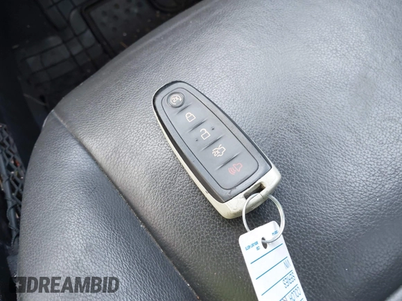 2015 Ford Escape Titanium with VIN 1FMCU9J91FUA26624, listed as a IAAI auction lot 40854175 with 132,313 mi miles. Bid and sale history available at carsss.com. Image 11.