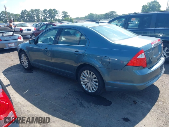 2011 Ford Fusion Hybrid with VIN 3FADP0L3XBR217504, listed as a IAAI auction lot 42633083 with 166,274 mi miles and . Bid and sale history available at DreamBid. Image 3.