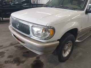 2000 Mercury Mountaineer z VIN 4M2ZU86P7YUJ40690, wystawiony jako IAAI lot #42367495 z przebiegiem 202 988 mil mil oraz . Historia ofert i sprzedaży dostępna na DreamBid. Obrazek 6.