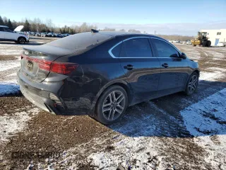 2023 Kia Forte GT-Line with VIN 3KPF34AD0PE605566, listed as a Copart auction lot 79692264 with 93,276 mi miles and Salvage Title. Bid and sale history available at carsss.com. Image 3.