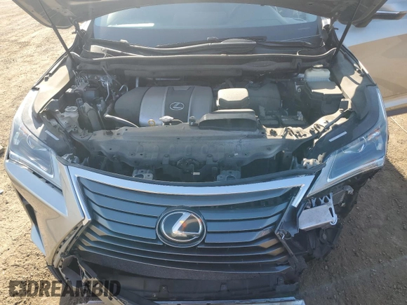 2017 Lexus RX 350 z VIN 2T2BZMCA5HC108623, wystawiony jako Copart lot #60091395 z przebiegiem 73 751 mil mil oraz Szkoda całkowita • Salvage title. Historia ofert i sprzedaży dostępna na DreamBid. Obrazek 12.