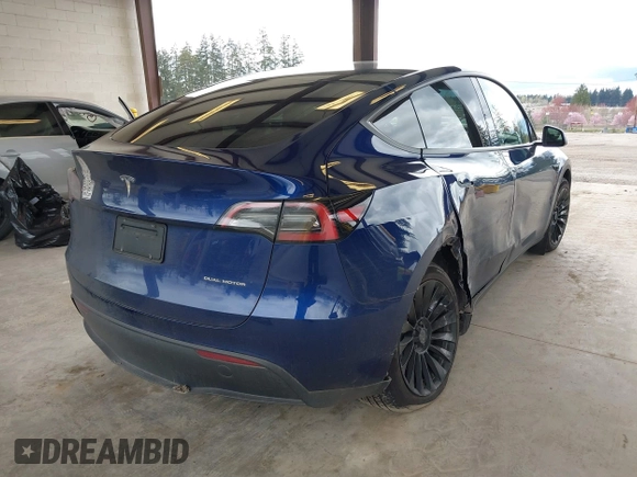 2023 Tesla Model Y Long Range with VIN 7SAYGDEEXPF621397, listed as a IAAI auction lot 41922714 with 29,460 mi miles. Bid and sale history available at carsss.com. Image 4.