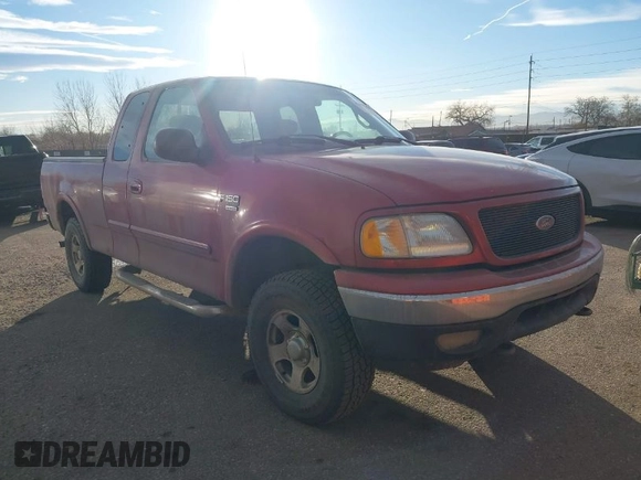 2001 Ford F-150 XL with VIN 1FTRX18L21NB46718, listed as a IAAI auction lot 41477101 with 156,702 mi miles. Bid and sale history available at carsss.com. Image 1.