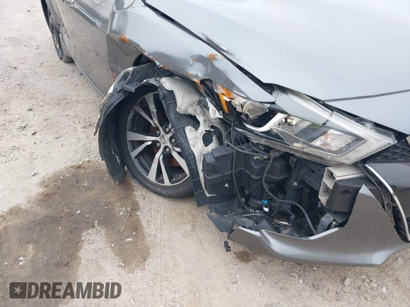 2018 Nissan Maxima S with VIN 1N4AA6AP0JC384660, listed as a IAAI auction lot 41617587 with 121,463 mi miles and . Bid and sale history available at DreamBid. Image 6.