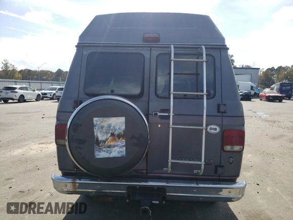 1994 Chevrolet Chevy Van с VIN 1GBEG25K5RF123489, выставлен на аукционе Copart как лот 79491854 с пробегом 82 970 миль миль и Списание • Salvage title. История ставок и продаж доступна на DreamBid. Изображение 6.