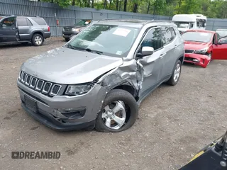 2021 Jeep Compass Latitude with VIN 3C4NJDBBXMT569861, listed as a IAAI auction lot 42325006 with 83,153 mi miles and . Bid and sale history available at DreamBid. Image 18.