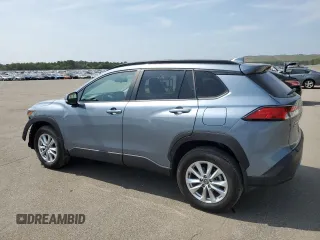 2023 Toyota Corolla Cross LE with VIN 7MUCAABG4PV054828, listed as a Copart auction lot 59466855 with 23,884 mi miles and Salvage title. Bid and sale history available at DreamBid. Image 2.