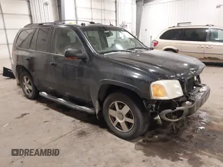 2005 GMC Envoy SLT with VIN 1GKDT13S452349125, listed as a IAAI auction lot 41148381 with 224,049 mi miles. Bid and sale history available at carsss.com. Image 1.