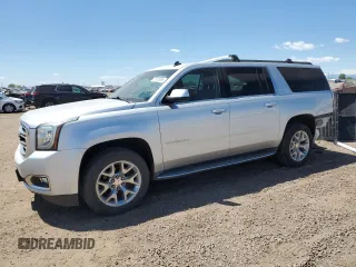 2015 GMC Yukon XL SLT z VIN 1GKS2HKC9FR224711, wystawiony jako Copart lot #57056365 z przebiegiem 161 080 mil mil oraz Szkoda całkowita • Salvage title. Historia ofert i sprzedaży dostępna na DreamBid. Obrazek 1.
