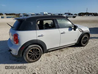 2016 MINI Countryman S with VIN WMWZC5C51GWU01290, listed as a Copart auction lot 77684384 with 106,811 mi miles and Salvage Title. Bid and sale history available at DreamBid. Image 3.