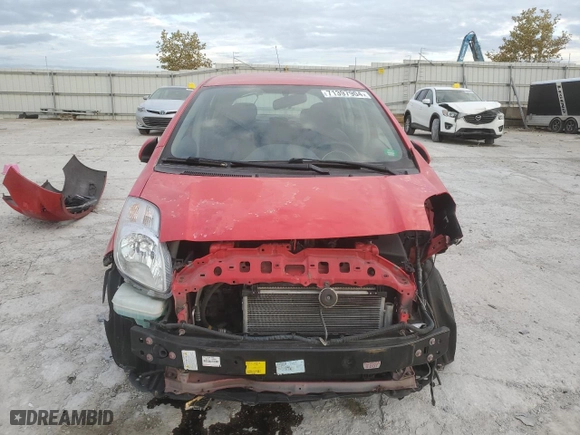 2009 Toyota Yaris with VIN JTDKT903995232885, listed as a Copart auction lot 71397904 with 112,804 mi miles and Salvage Title. Bid and sale history available at carsss.com. Image 5.
