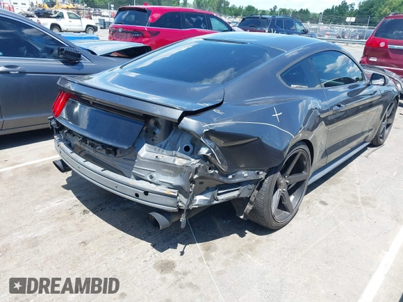 2015 Ford Mustang EcoBoost z VIN 1FA6P8TH5F5351476, wystawiony jako IAAI lot #42157688 z przebiegiem 134 131 mil mil oraz . Historia ofert i sprzedaży dostępna na DreamBid. Obrazek 4.