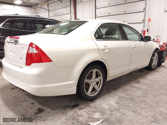 2011 Ford Fusion SEL with VIN 3FAHP0JA5BR273000, listed as a IAAI auction lot 41621394 with 153,578 mi miles. Bid and sale history available at carsss.com. Image 4.