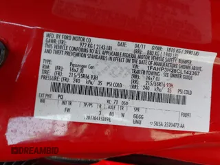2012 Ford Focus SEL with VIN 1FAHP3H28CL142367, listed as a IAAI auction lot 41991603 with 223,944 mi miles. Bid and sale history available at carsss.com. Image 9.
