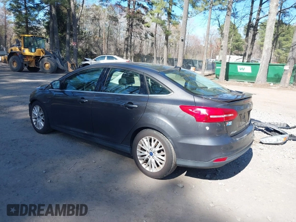 2015 Ford Focus Titanium with VIN 1FADP3J25FL333743, listed as a IAAI auction lot 41857057 with 120,917 mi miles and . Bid and sale history available at carsss.com. Image 3.
