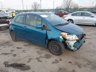 2013 Toyota Yaris L with VIN JTDJTUD38DD553999, listed as a IAAI auction lot 41642903 with 75,795 mi miles. Bid and sale history available at carsss.com. Image 1.