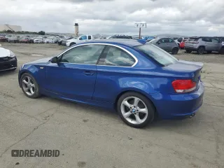 2009 BMW 1 Series 128i with VIN WBAUP93529VF49255, listed as a Copart auction lot 51100045 with 153,841 mi miles and Clean title. Bid and sale history available at DreamBid. Image 2.