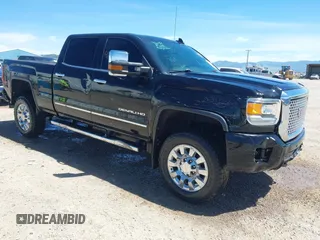 2016 GMC Sierra 2500HD Denali z VIN 1GT12UE88GF282948, wystawiony jako IAAI lot #42043335 z przebiegiem 153 912 mil mil oraz . Historia ofert i sprzedaży dostępna na DreamBid. Obrazek 1.