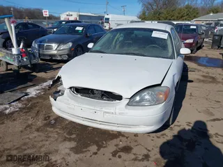 2001 Ford Taurus SES with VIN 1FAFP55231A243171, listed as a IAAI auction lot 41429890 with 131,537 mi miles. Bid and sale history available at carsss.com. Image 2.