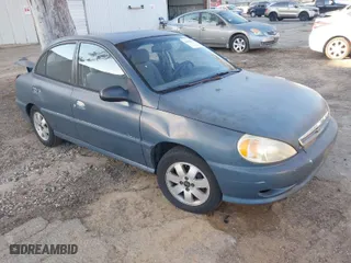 2002 Kia Rio with VIN KNADC123826128733, listed as a IAAI auction lot 41643123 with 101,433 mi miles. Bid and sale history available at carsss.com. Image 1.