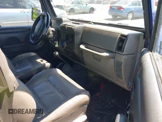 1997 Jeep Wrangler SE z VIN 1J4FY29P8VP400766, wystawiony jako IAAI lot #42270265 z przebiegiem 191 283 mil mil oraz . Historia ofert i sprzedaży dostępna na DreamBid. Obrazek 5.