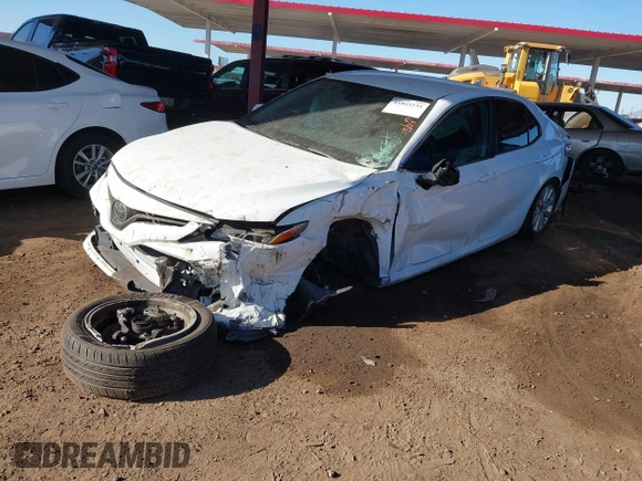 2020 Toyota Camry LE with VIN 4T1C11AK7LU401666, listed as a IAAI auction lot 41865235 with 69,189 mi miles. Bid and sale history available at carsss.com. Image 17.