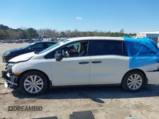 2019 Honda Odyssey LX with VIN 5FNRL6H23KB049236, listed as a IAAI auction lot 41633339 with 96,000 mi miles and . Bid and sale history available at DreamBid. Image 14.