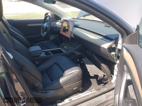 2023 Tesla Model 3 with VIN 5YJ3E1EA8PF626235, listed as a IAAI auction lot 42022893 with 30,333 mi miles and . Bid and sale history available at DreamBid. Image 5.