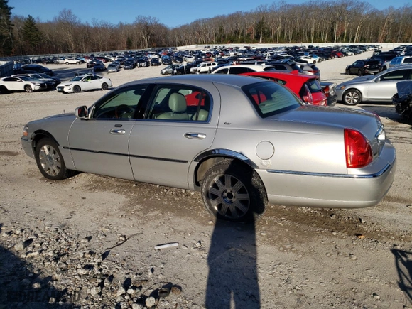 2003 Lincoln Town Car Cartier with VIN 1LNHM83W63Y692465, listed as a Copart auction lot 84882984 with 106,405 mi miles and Clean Title. Bid and sale history available at carsss.com. Image 2.