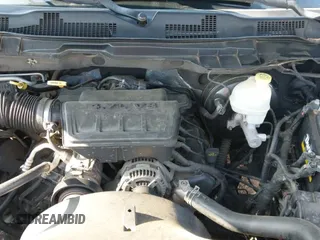 2013 Ram 1500 SLT z VIN 1C6RR6GP9DS534988, wystawiony jako IAAI lot #42792399 z przebiegiem 165 857 mil mil oraz . Historia ofert i sprzedaży dostępna na DreamBid. Obrazek 19.