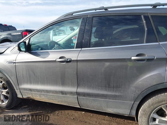 2013 Ford Escape SEL with VIN 1FMCU0HX1DUD51965, listed as a IAAI auction lot 41667262 with 164,493 mi miles and . Bid and sale history available at DreamBid. Image 14.