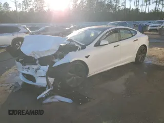 2021 Tesla Model S Plaid with VIN 5YJSA1E60MF439151, listed as a Copart auction lot 85957214 with 0 mi miles and Salvage Title. Bid and sale history available at carsss.com. Image 1.