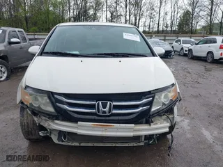 2015 Honda Odyssey Touring Elite with VIN 5FNRL5H98FB076428, listed as a IAAI auction lot 41998339 with 114,573 mi miles. Bid and sale history available at carsss.com. Image 12.
