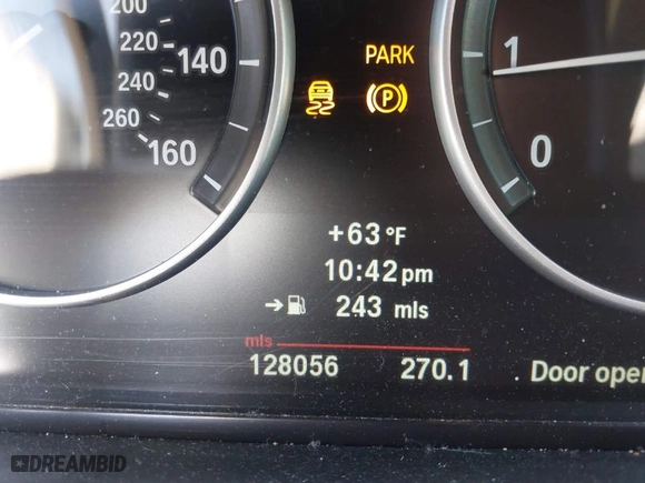 2012 BMW 5 Series 528i with VIN WBAXG5C54CDY28805, listed as a IAAI auction lot 41777043 with 128,056 mi miles. Bid and sale history available at carsss.com. Image 7.