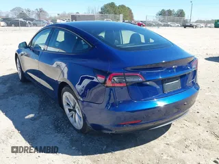 2021 Tesla Model 3 Long Range with VIN 5YJ3E1EB3MF031457, listed as a IAAI auction lot 41630758 with 71,113 mi miles and . Bid and sale history available at carsss.com. Image 6.