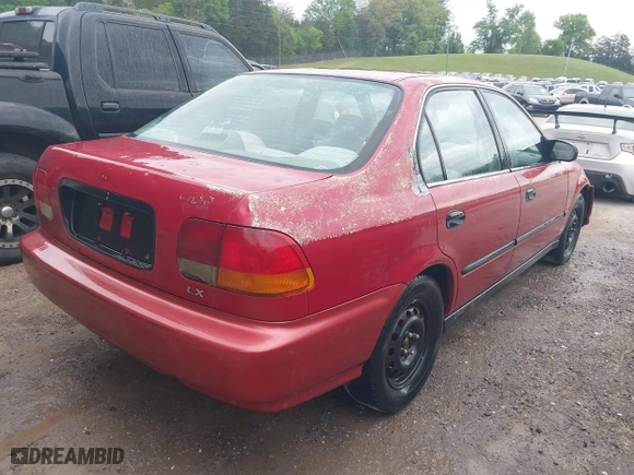 1997 Honda Civic LX "O" w/Air with VIN 1HGEJ6672VL019621, listed as a IAAI auction lot 42081226 with 194,957 mi miles. Bid and sale history available at carsss.com. Image 4.