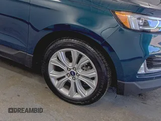 2020 Ford Edge Titanium z VIN 2FMPK3K91LBB37761, wystawiony jako IAAI lot #42829390 z przebiegiem 90 117 mil mil oraz . Historia ofert i sprzedaży dostępna na DreamBid. Obrazek 34.
