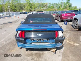 2022 Ford Mustang EcoBoost z VIN 1FATP8UH4N5102828, wystawiony jako IAAI lot #42073571 z przebiegiem 69 931 mil mil oraz . Historia ofert i sprzedaży dostępna na DreamBid. Obrazek 16.