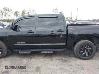 2012 Toyota Tundra 4WD Truck with VIN 5TFDW5F14CX268378, listed as a IAAI auction lot 41412922 with 148,763 mi miles. Bid and sale history available at carsss.com. Image 14.