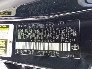 2025 Toyota Camry LE z VIN 4T1DAACK5SU581231, wystawiony jako IAAI lot #41934940 z przebiegiem 9887 mil mil oraz . Historia ofert i sprzedaży dostępna na DreamBid. Obrazek 9.