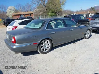 2005 Jaguar XJ with VIN SAJWA79C85SG48974, listed as a IAAI auction lot 41844684 with 154,145 mi miles. Bid and sale history available at carsss.com. Image 4.