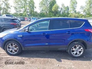 2013 Ford Escape SEL z VIN 1FMCU9H92DUA24951, wystawiony jako IAAI lot #42408755 z przebiegiem 173 549 mil mil oraz . Historia ofert i sprzedaży dostępna na DreamBid. Obrazek 14.