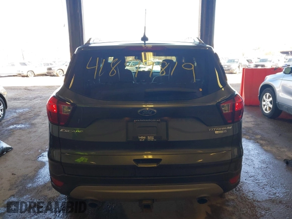 2019 Ford Escape Titanium with VIN 1FMCU9J95KUA19816, listed as a IAAI auction lot 41899819 with 71,760 mi miles and . Bid and sale history available at DreamBid. Image 16.