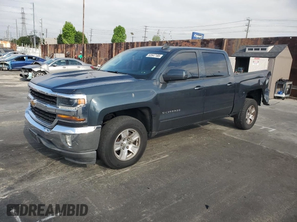 2017 Chevrolet Silverado 1500 LT with VIN 3GCPCREH6HG364570, listed as a Copart auction lot 52647185 with 132,473 mi miles and Salvage Title. Bid and sale history available at DreamBid. Image 1.