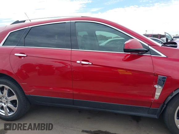2012 Cadillac SRX Premium Collection with VIN 3GYFNCE3XCS610463, listed as a IAAI auction lot 41911167 with 148,118 mi miles and . Bid and sale history available at DreamBid. Image 13.